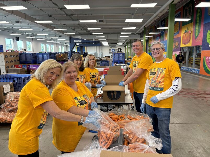 Volunteers sorting fresh produce 