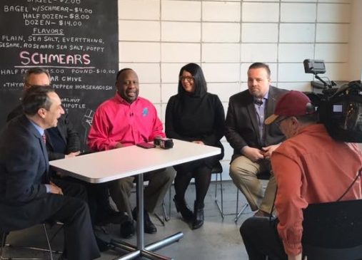 Lillian Kuri seated with other Cleveland Chain Reaction investors during an interview to announce the series.