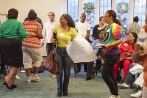 Neighborhood residents gather in a meeting room for a NeighborUp Network Night