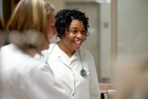 Two nursing students pictured in the Fred A. Lennon Charitable Trust Nursing Skills Lab.