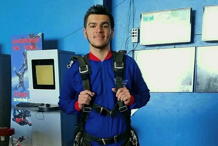 Martin Cantera poses in skydiving gear