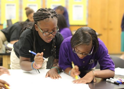 Two students at a Breakthrough School work on a project together