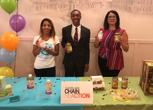 Founders of BabyMunch and Holmes Apple Sauce pictured with Lillian Kuri behind table with products