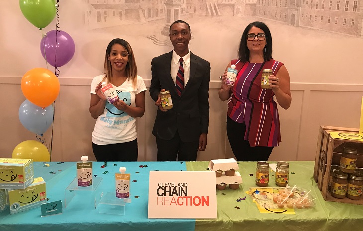 Founders of BabyMunch and Holmes Apple Sauce pictured with Lillian Kuri behind table with products