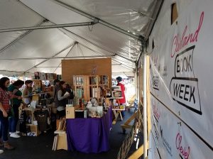 book shelves and tent at Cleveland Flea