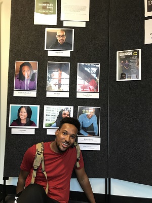 Brinden sits below the headshots of himself and other actors in play 