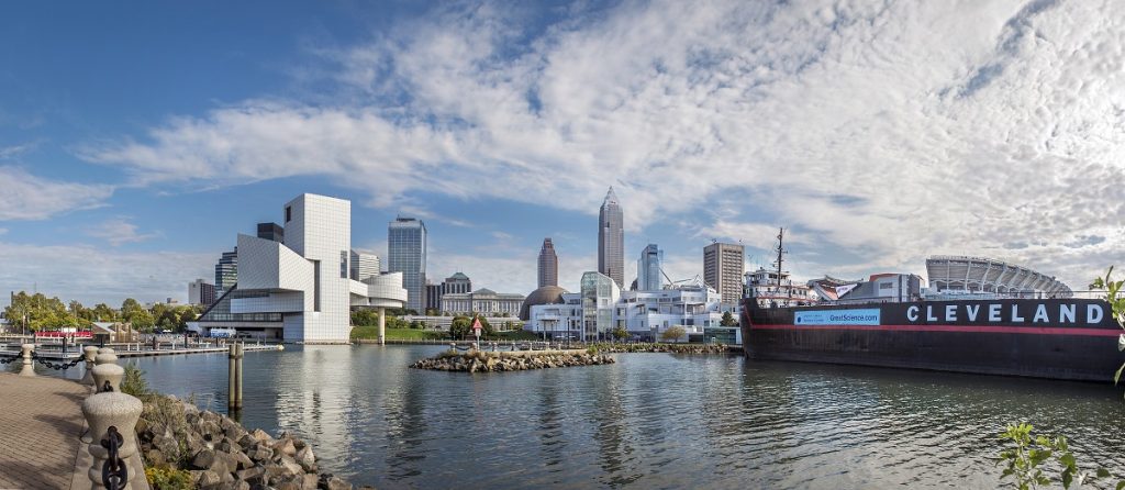 View of Cleveland skyline from lake erie shows rock hall and science center