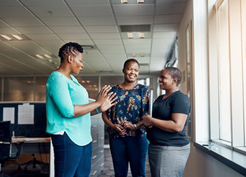 Shot of colleagues having a discussion in a modern office