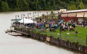 5k particpants gather at Merwins Wharf after the race