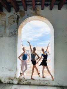 Photo of dancers Kelly Korfhage, Kate Webb and Emmie Dietz at the ProDanza Studios