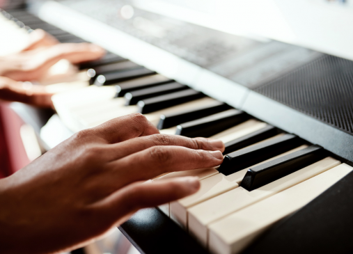 Hands on piano keys