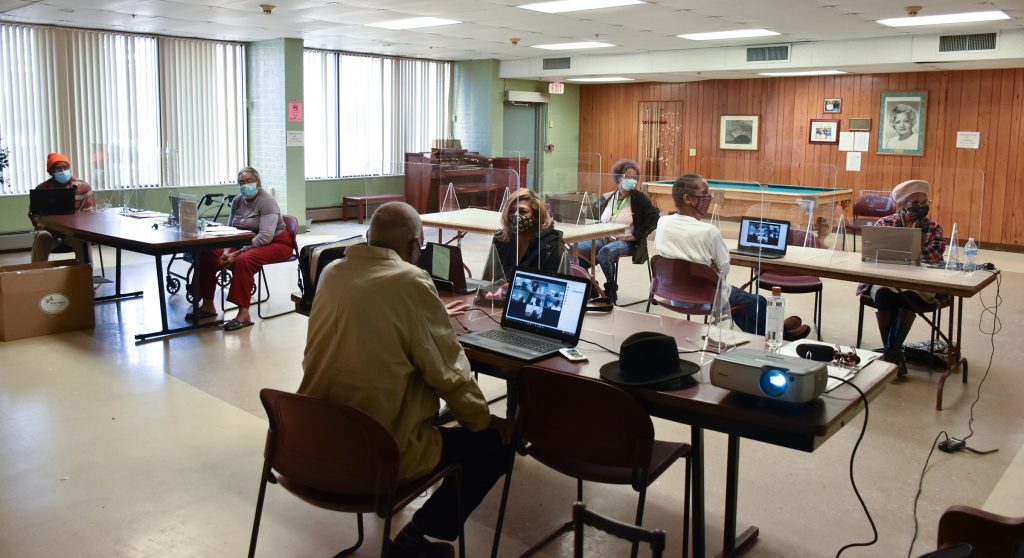 Residents attend a technology class at ASC3