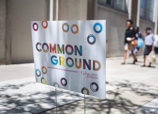 A Common Ground yard sign is pictured outside an event location