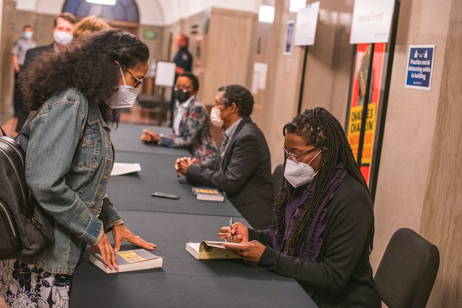 Authors signing books